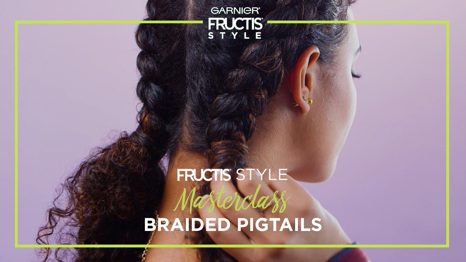 The back of a girl's head displaying the Braided Pigtails hairstyle.